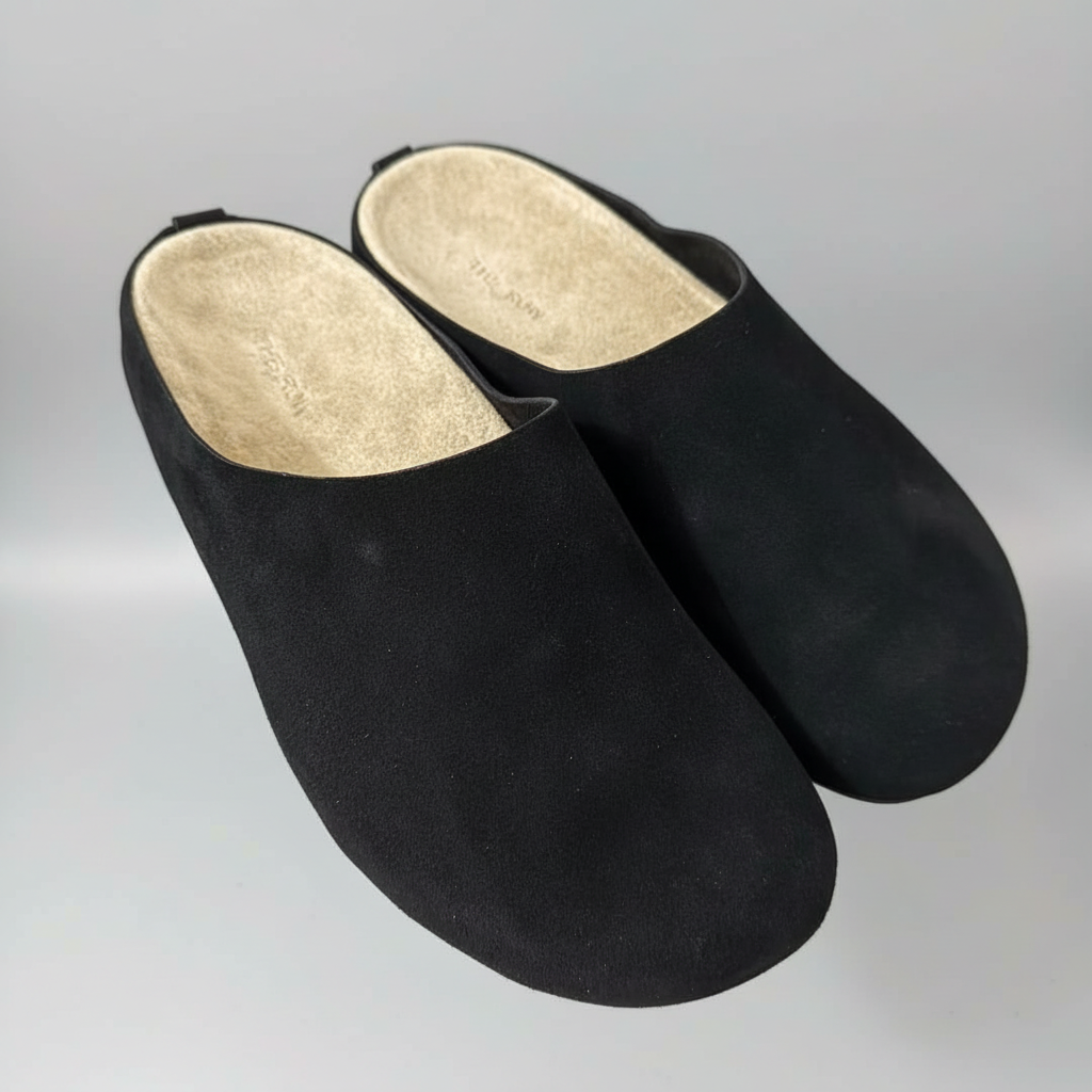 Suede slip-on slippers in black
